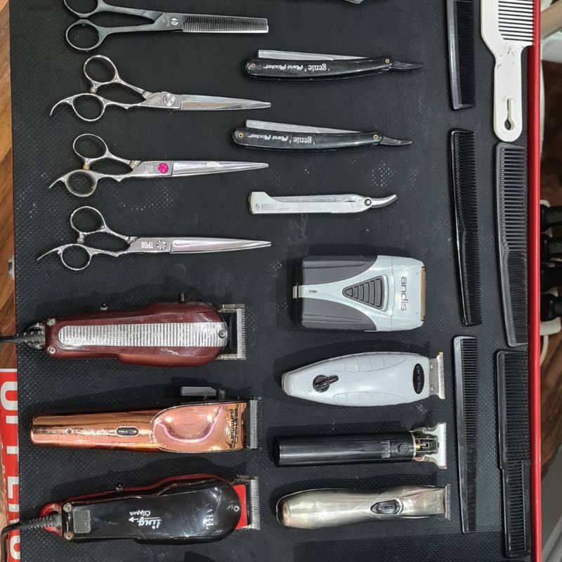 Scissors, razors and clippers laid out
