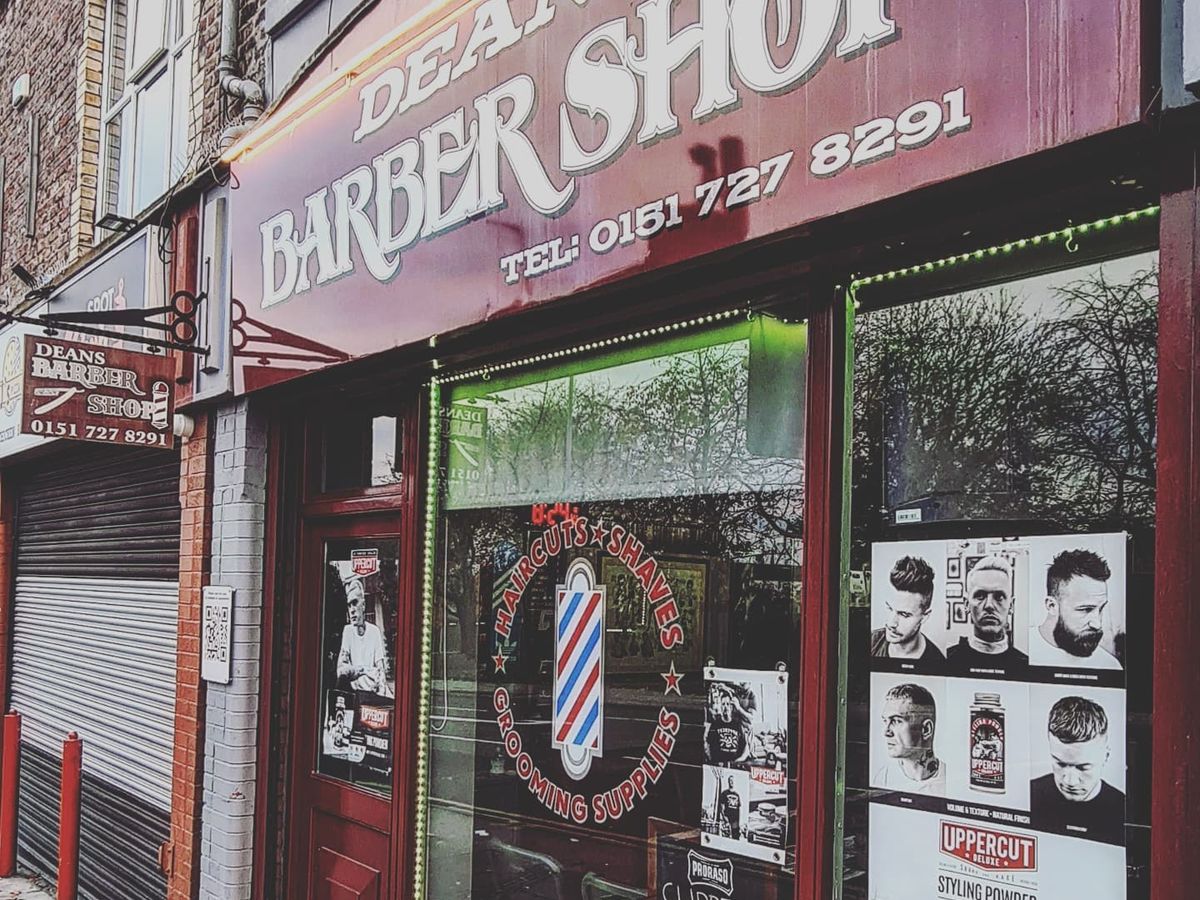 Dean's Barber Shop fascia and barber pole on Park Road
